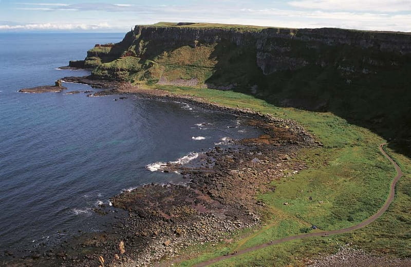 Belfast Giant's Causeway and Titanic Distillery Whiskey Tour - Dunluce Castle above the Atlantic