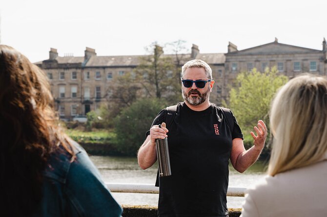 Explore Glasgow: Scottish Rogue Whisky Walking Pub Crawl - Walking beside the River Clyde