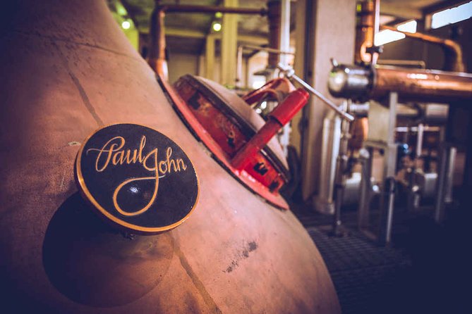 Private Whiskey distillery tour at John Distilleries - Brilliance, Edited, and Bold on the tasting table